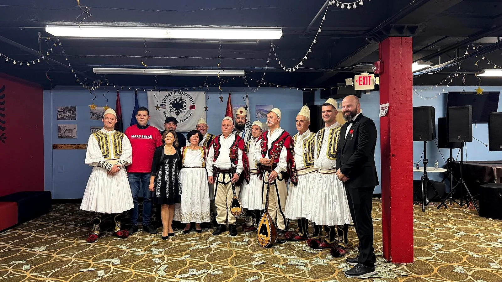 Albanian folk musicians in traditional dress with lahuta and çifteli