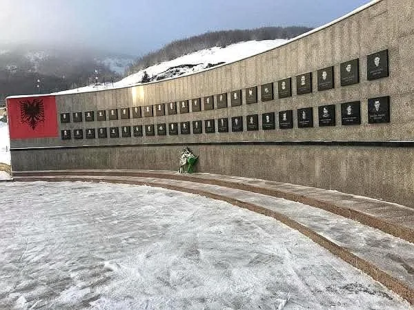 Memorial wall honoring Albanian national heroes